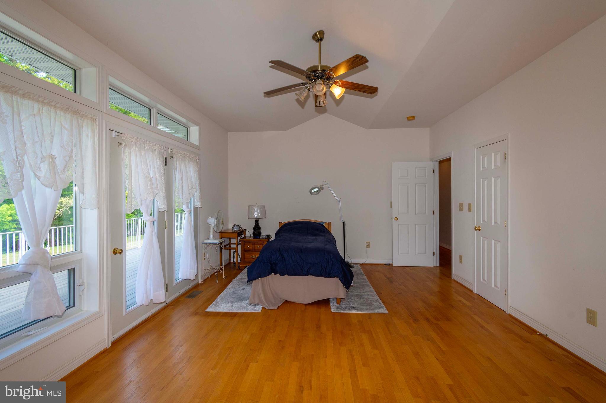 6000 Haleys Mill Road Spotsylvania, VA 22551 - Photo 42 of 85 a bedroom with a bed and a window