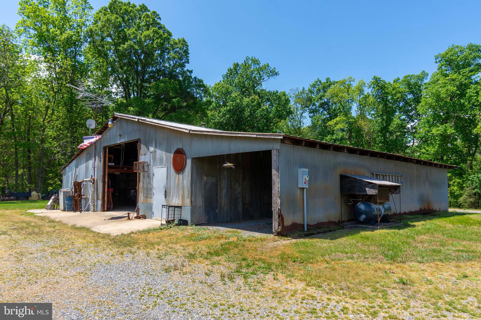 6000 Haleys Mill Road Spotsylvania, VA 22551 - Photo 61 of 85 a view of a house with a yard and large tree
