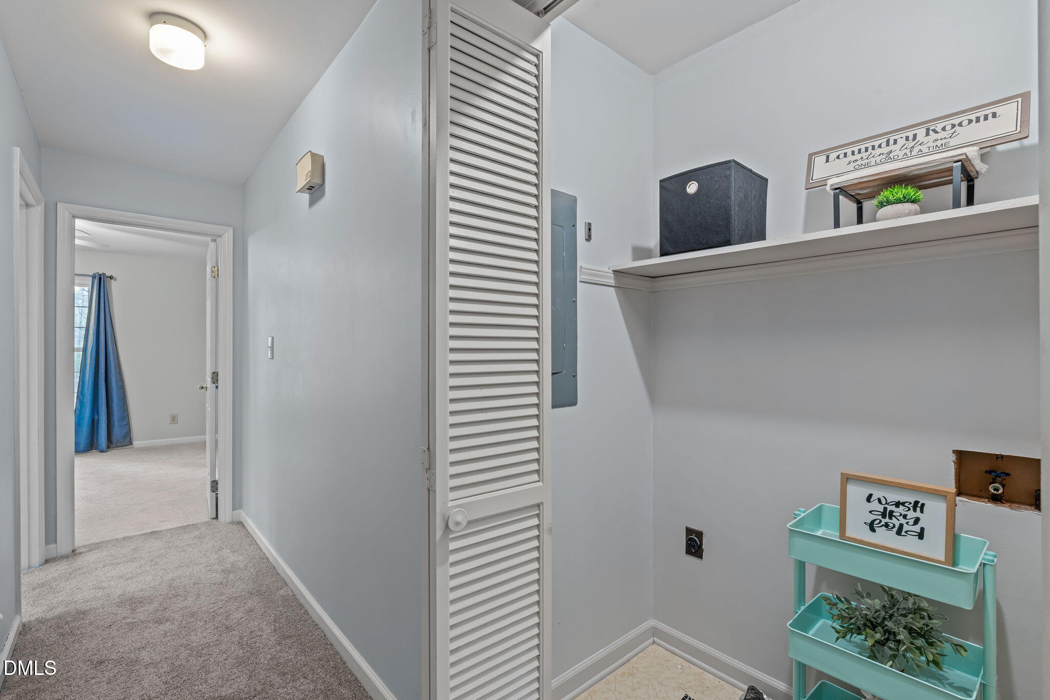 3304 Wade Avenue Raleigh, NC 27607 - Photo 22 of 38 a view of hallway with cabinets and wooden floor
