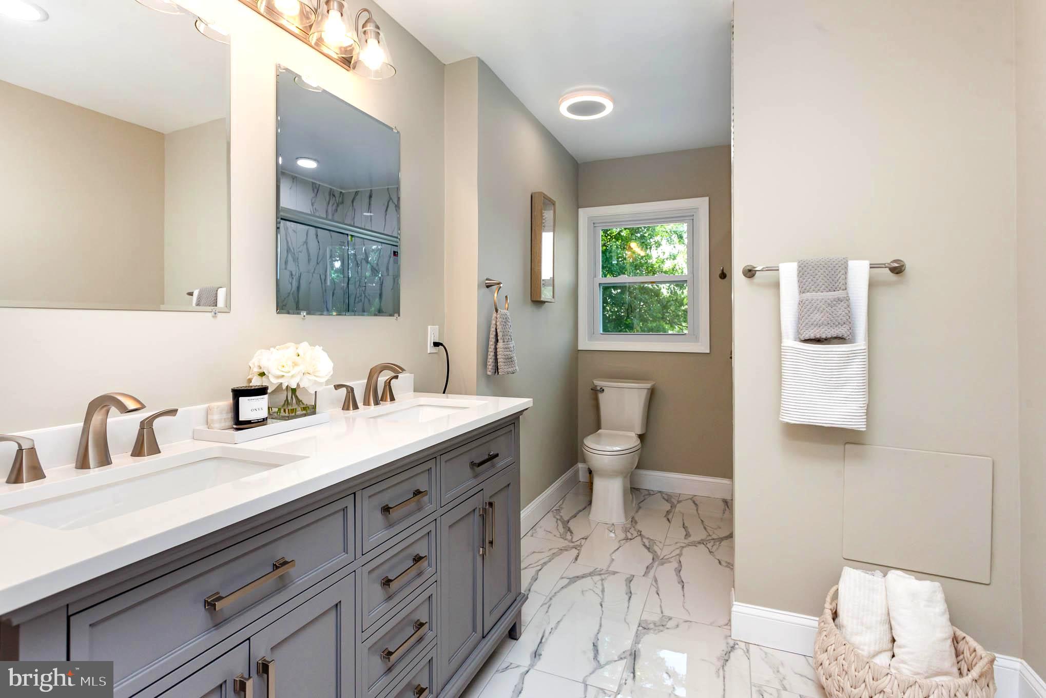 5740 Allender Road White Marsh, MD 21162 - Photo 29 of 60 Owner's suite bath double vanity bluetooth exhaust