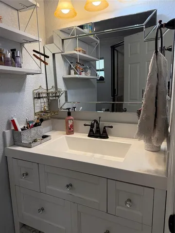 a sink with a washer and dryer
