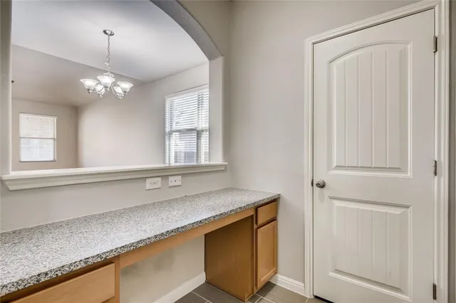 a view of a kitchen and a sink