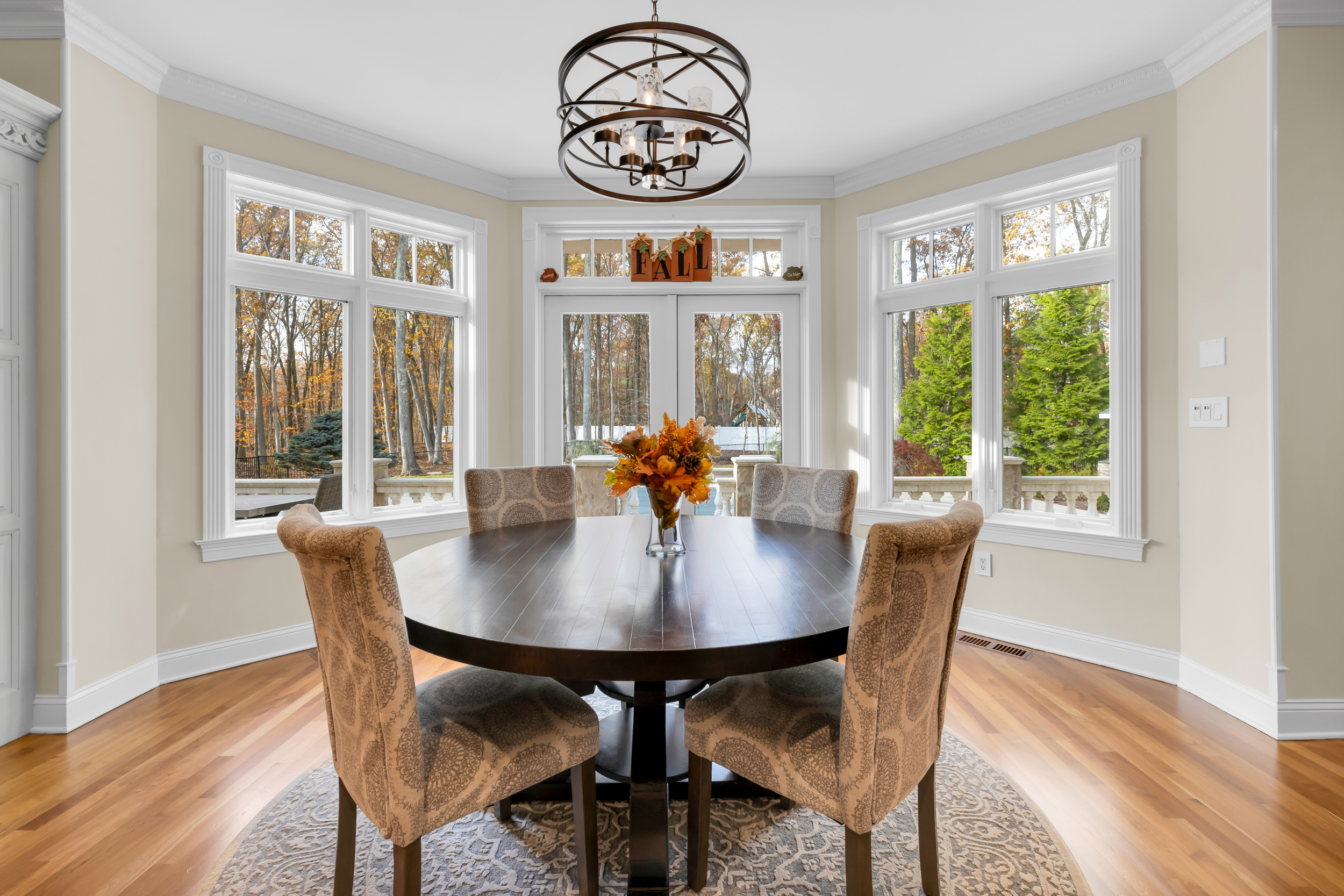 65 Ironwood Road Guilford, CT 06437 - Photo 12 of 40 a view of a dining room with furniture window and wooden floor