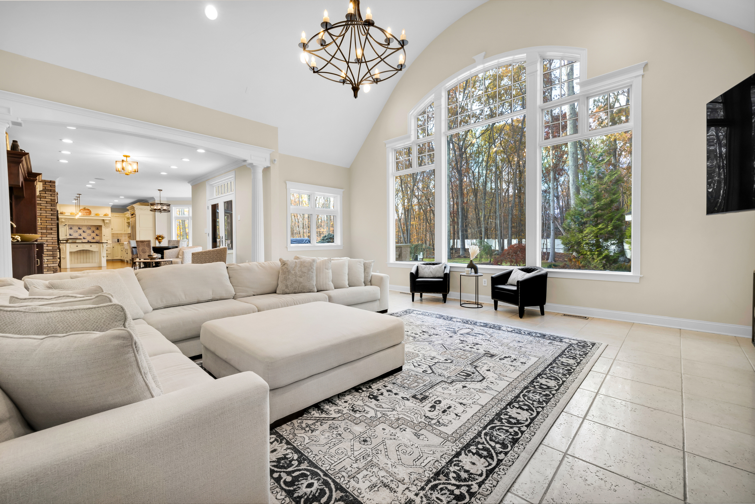 65 Ironwood Road Guilford, CT 06437 - Photo 14 of 40 a living room with furniture and a large window