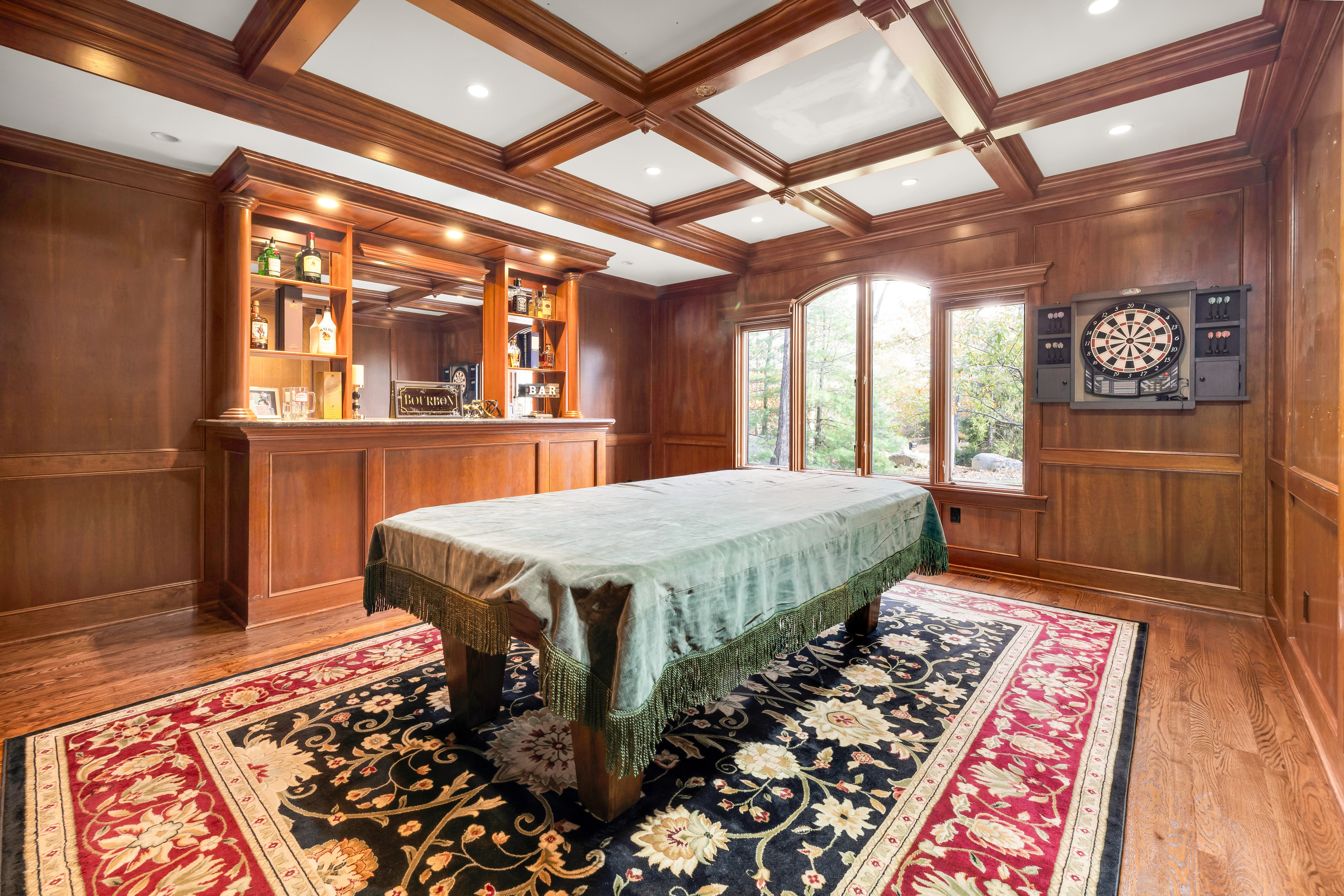 65 Ironwood Road Guilford, CT 06437 - Photo 15 of 40 a spacious bedroom with a bed and wooden floor