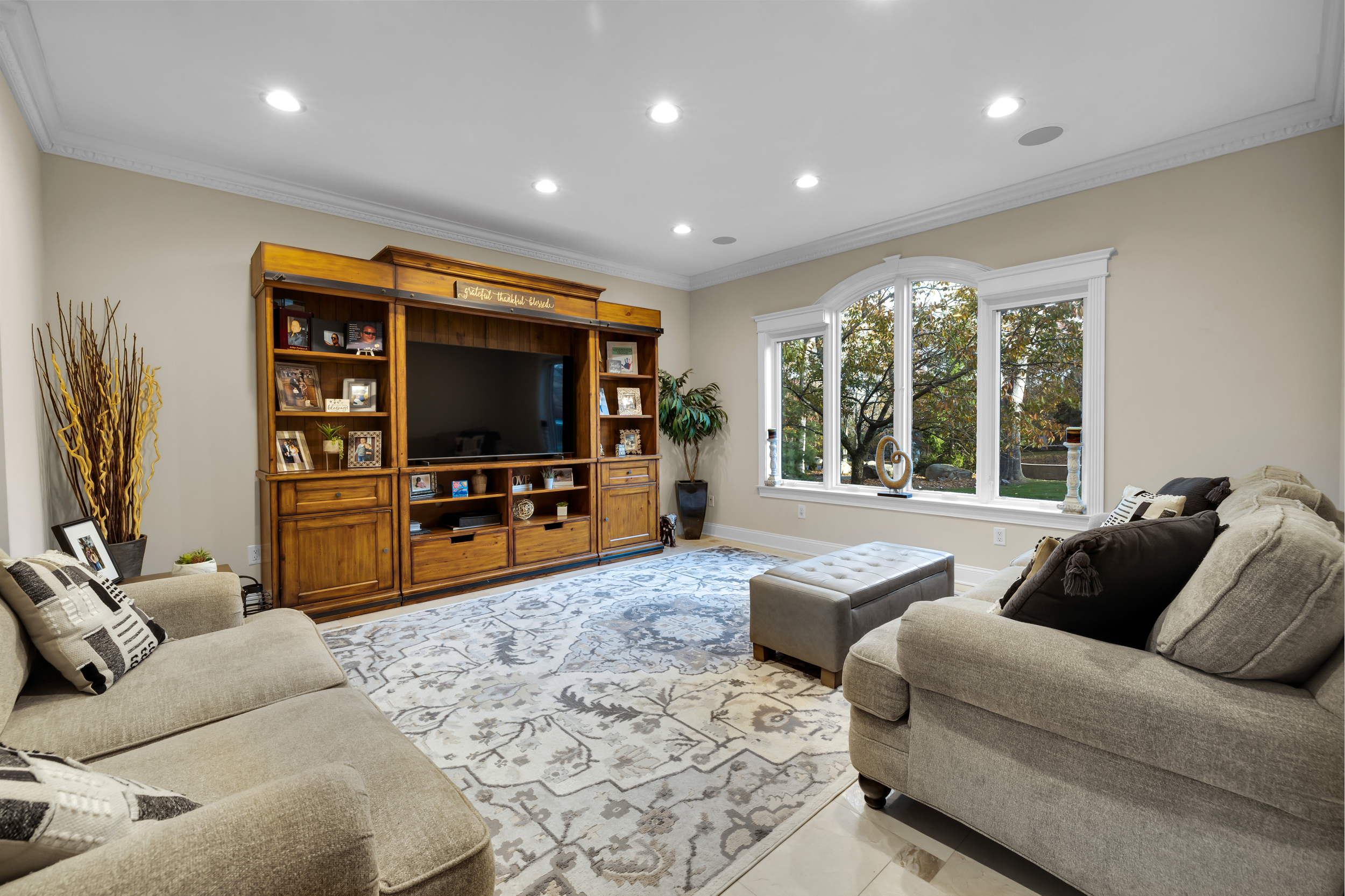 65 Ironwood Road Guilford, CT 06437 - Photo 16 of 40 a living room with furniture and a flat screen tv