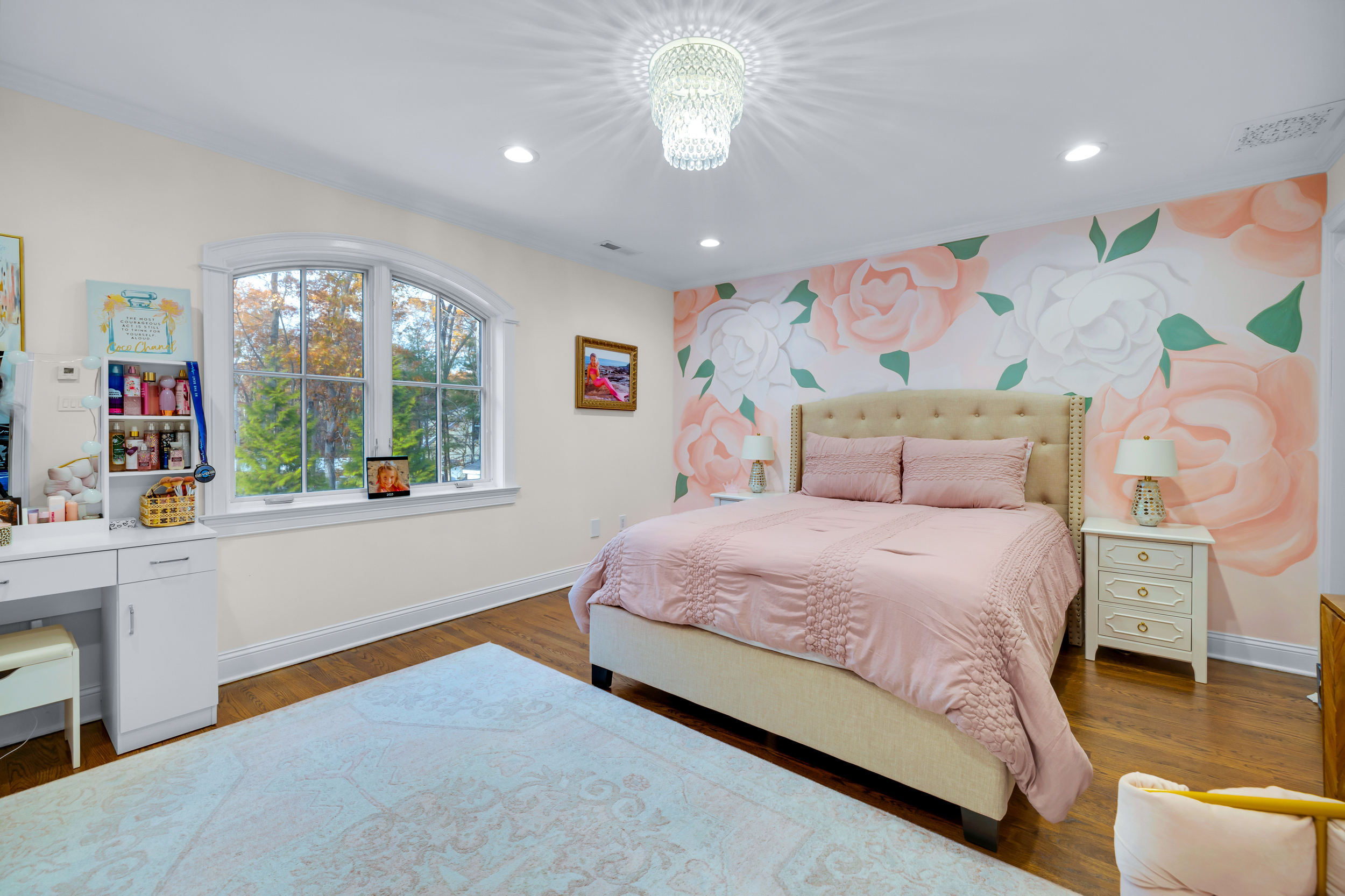65 Ironwood Road Guilford, CT 06437 - Photo 24 of 40 a bedroom with a bed and a large window