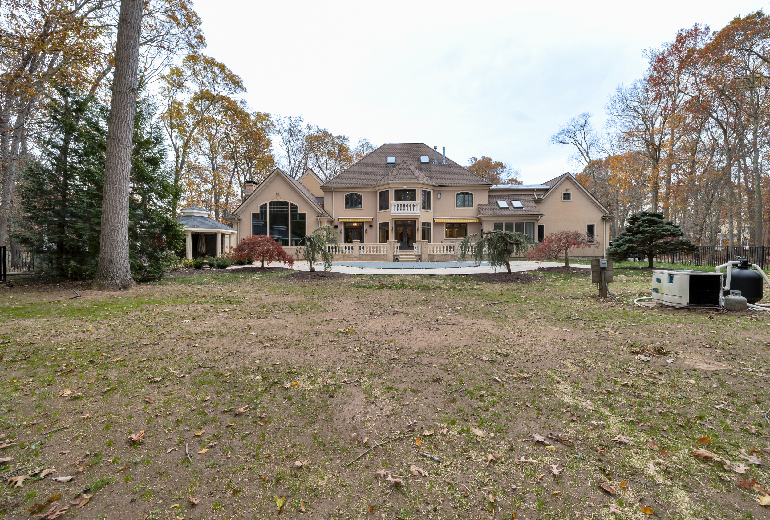 65 Ironwood Road Guilford, CT 06437 - Photo 36 of 40 a front view of a house with a yard