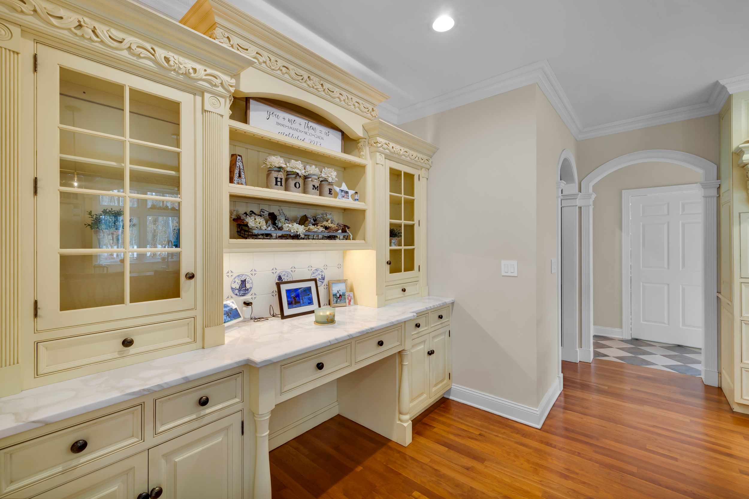 65 Ironwood Road Guilford, CT 06437 - Photo 10 of 40 a kitchen with stainless steel appliances cabinets and wooden floor