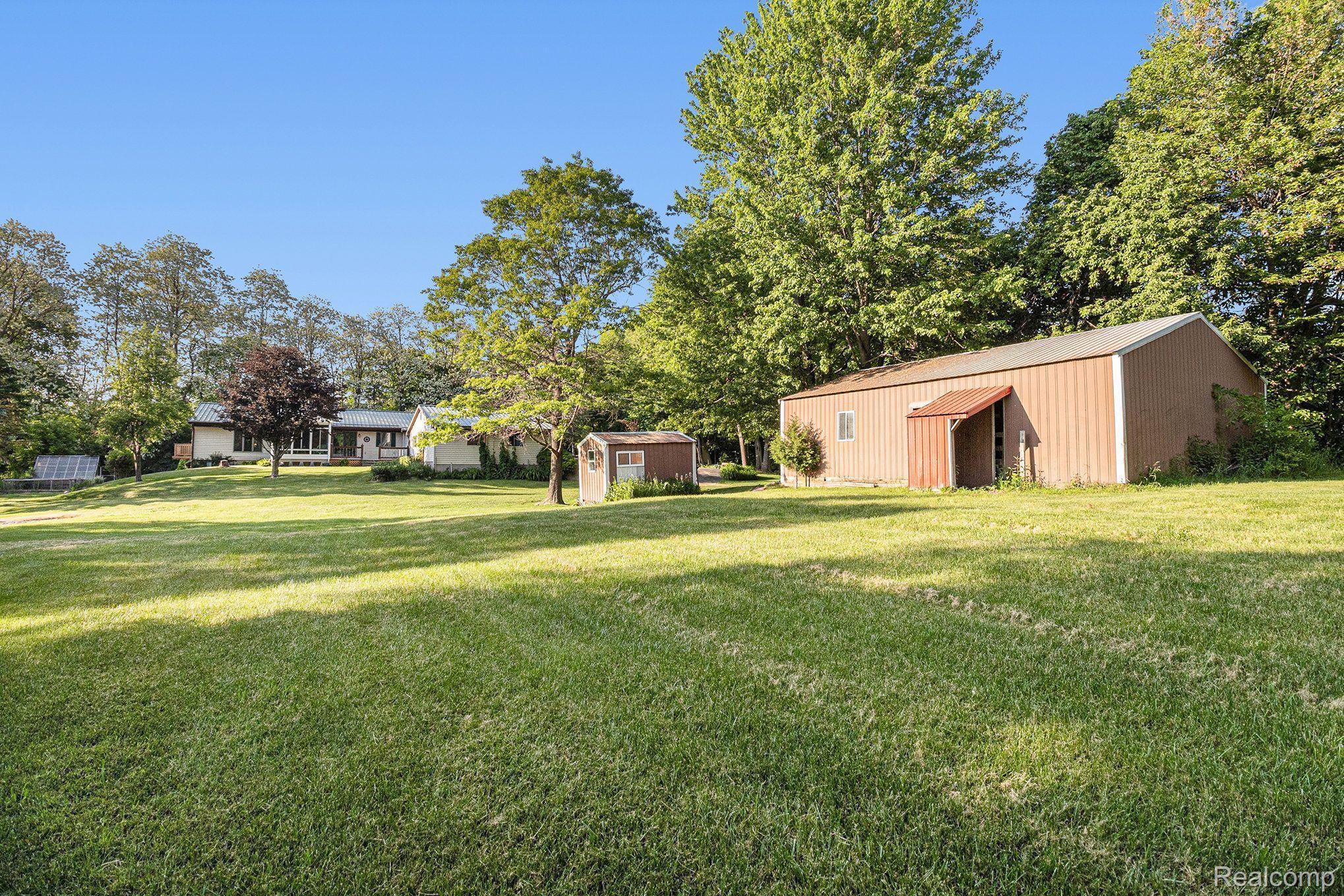 7280 Groveland Road Holly, MI 48442 - Photo 42 of 48 back of 30x40 pole barn