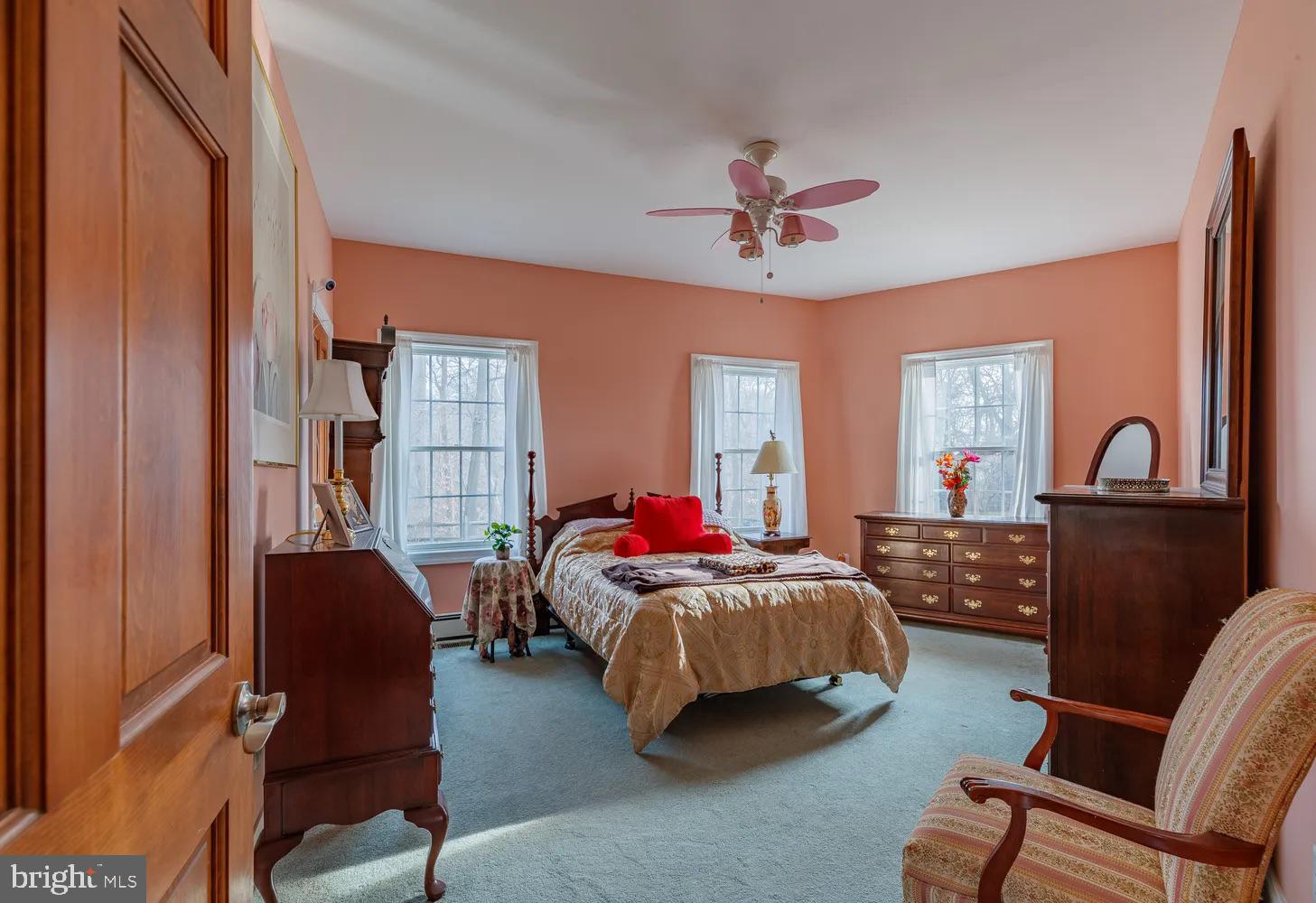 33487 Galena Sassafras Road Galena, MD 21635 - Photo 16 of 59 a bedroom with bed and wooden floor