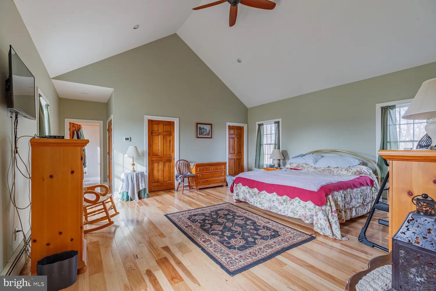 33487 Galena Sassafras Road Galena, MD 21635 - Photo 26 of 59 a bedroom with bed and wooden floor