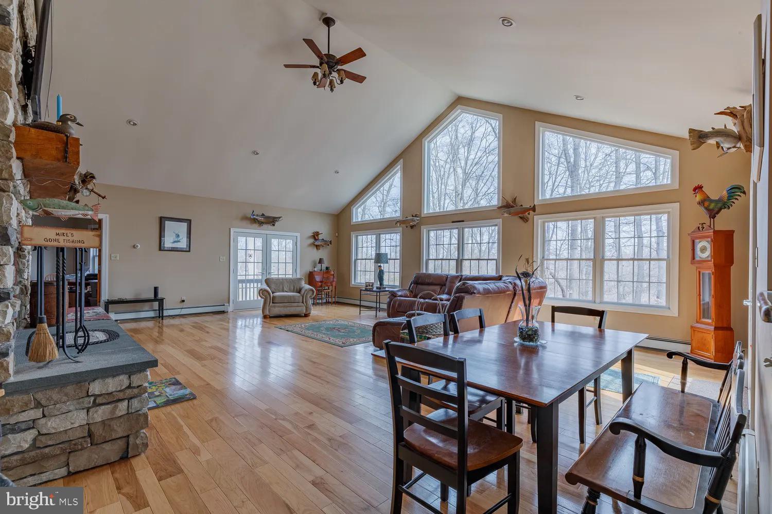 33487 Galena Sassafras Road Galena, MD 21635 - Photo 6 of 59 a view of a dining room with furniture window and wooden floor