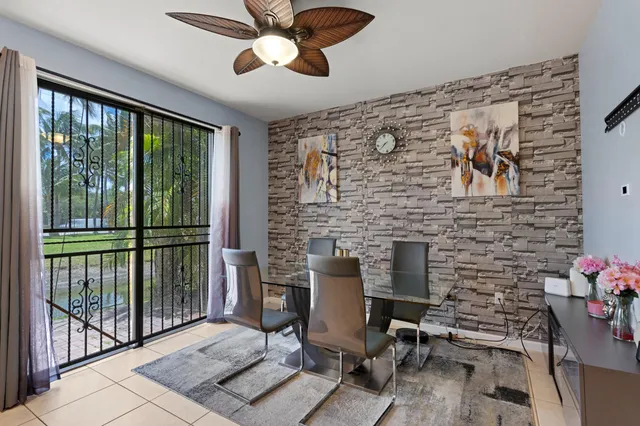 a workspace with furniture and a window