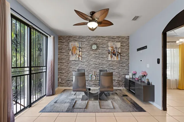 a living room with patio furniture