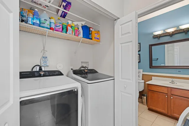 a utility room with washer and dryer