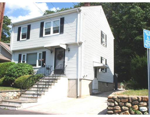 133 Fern Road Medford, MA 02155 - Photo 1 of 23 a view of a house with a patio