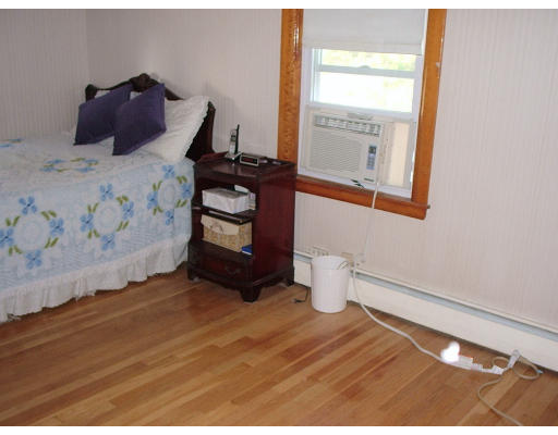133 Fern Road Medford, MA 02155 - Photo 18 of 23 a bedroom with a bed and a window