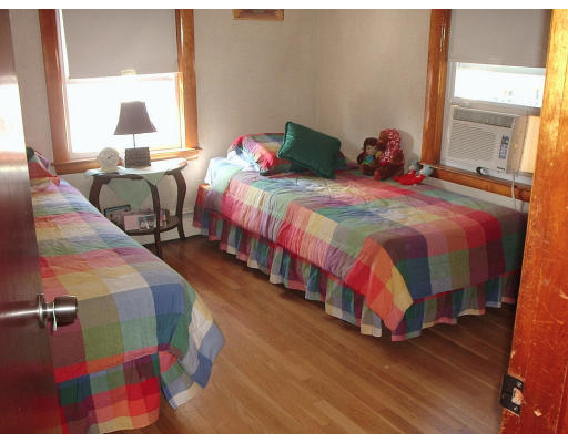 133 Fern Road Medford, MA 02155 - Photo 20 of 23 a bedroom with two beds and a large window