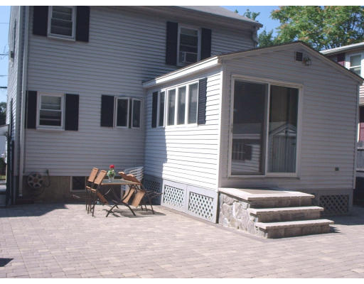 133 Fern Road Medford, MA 02155 - Photo 7 of 23 a view of house with outdoor seating area