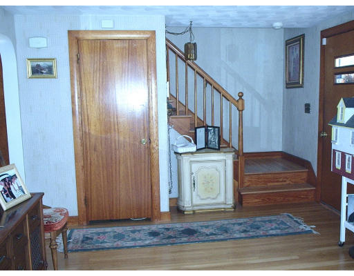 133 Fern Road Medford, MA 02155 - Photo 8 of 23 a view of entryway and hall with wooden floor