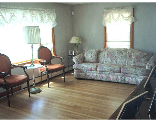 133 Fern Road Medford, MA 02155 - Photo 9 of 23 a living room with furniture and a large window