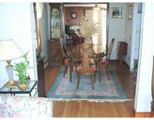 133 Fern Road Medford, MA 02155 - Photo 10 of 23 a view of a dining room with furniture and wooden floor