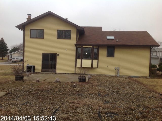 151 White Oaks Road Matteson, IL 60443 - Photo 12 of 12 a front view of a house with a yard
