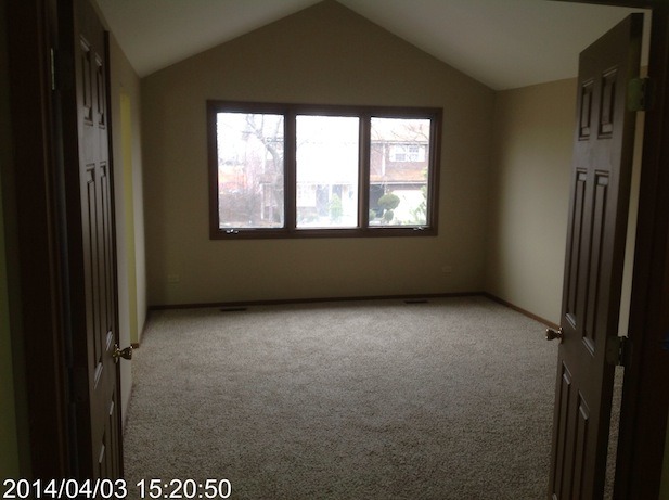 151 White Oaks Road Matteson, IL 60443 - Photo 9 of 12 an empty room with windows
