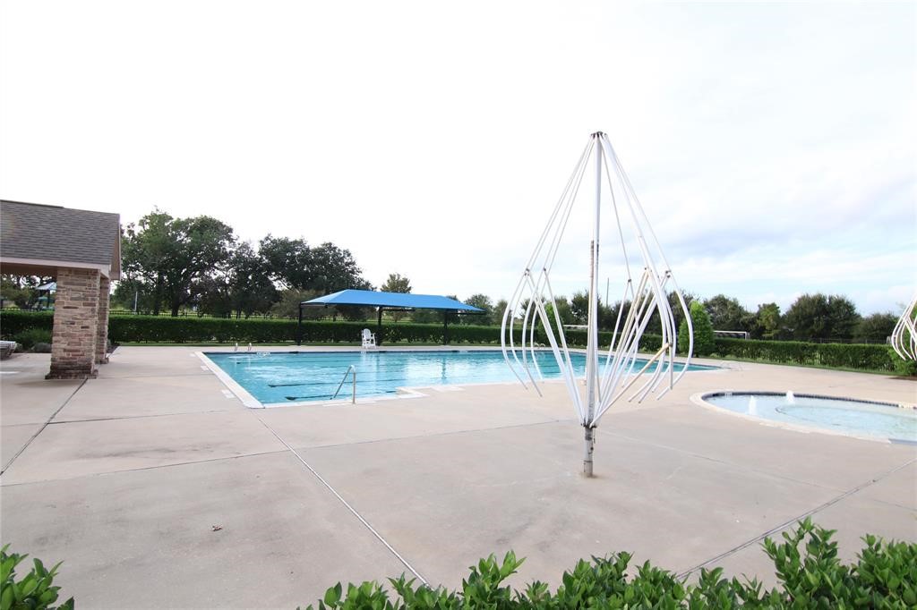6719 Rambling Manor Court Richmond, TX 77469 - Photo 25 of 26 a view of a park with slide