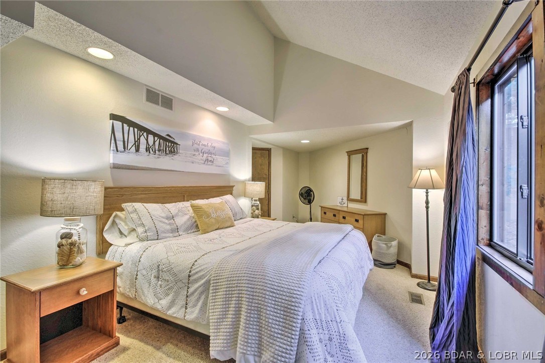 1082 Rachel Road, Unit 29 Osage Beach, MO 65065 - Photo 14 of 32 Primary bedroom on the main floor.