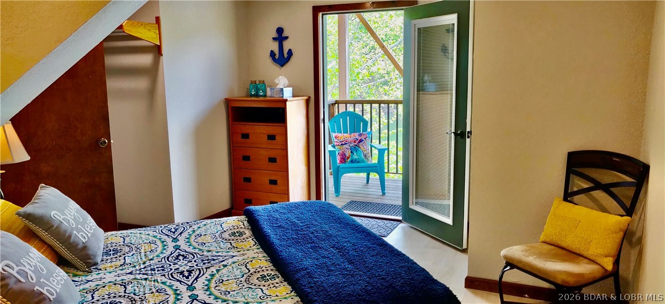 1082 Rachel Road, Unit 29 Osage Beach, MO 65065 - Photo 18 of 32 Basement suite with its own private deck.