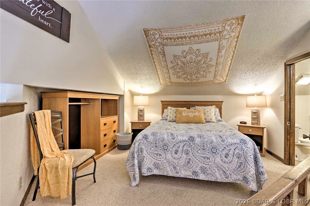1082 Rachel Road, Unit 29 Osage Beach, MO 65065 - Photo 20 of 32 Bedroom and 1/2 bath upstairs.