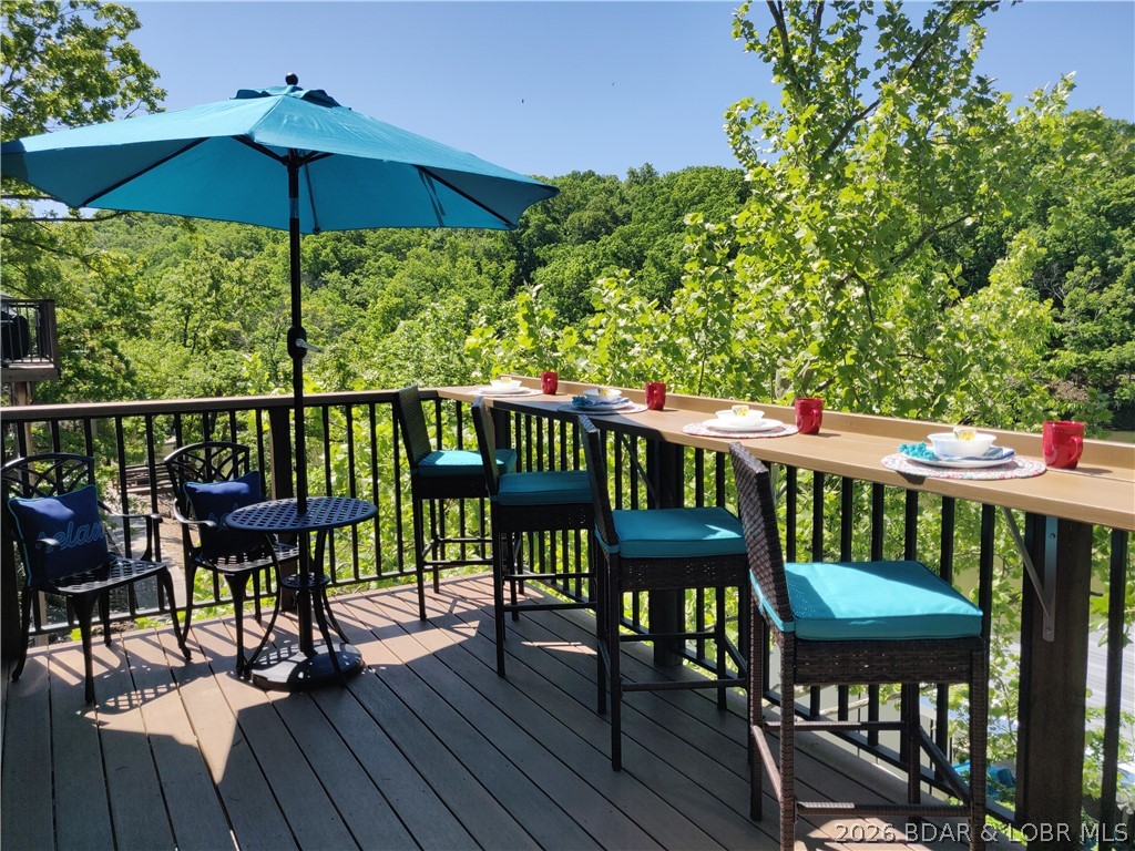 1082 Rachel Road, Unit 29 Osage Beach, MO 65065 - Photo 21 of 32 Deck off of main floor overlooking the lake