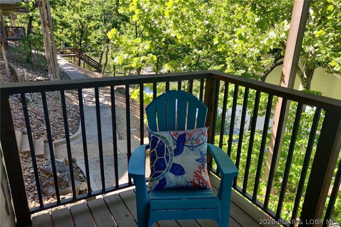 1082 Rachel Road, Unit 29 Osage Beach, MO 65065 - Photo 23 of 32 Basement suite deck overlooking the water.