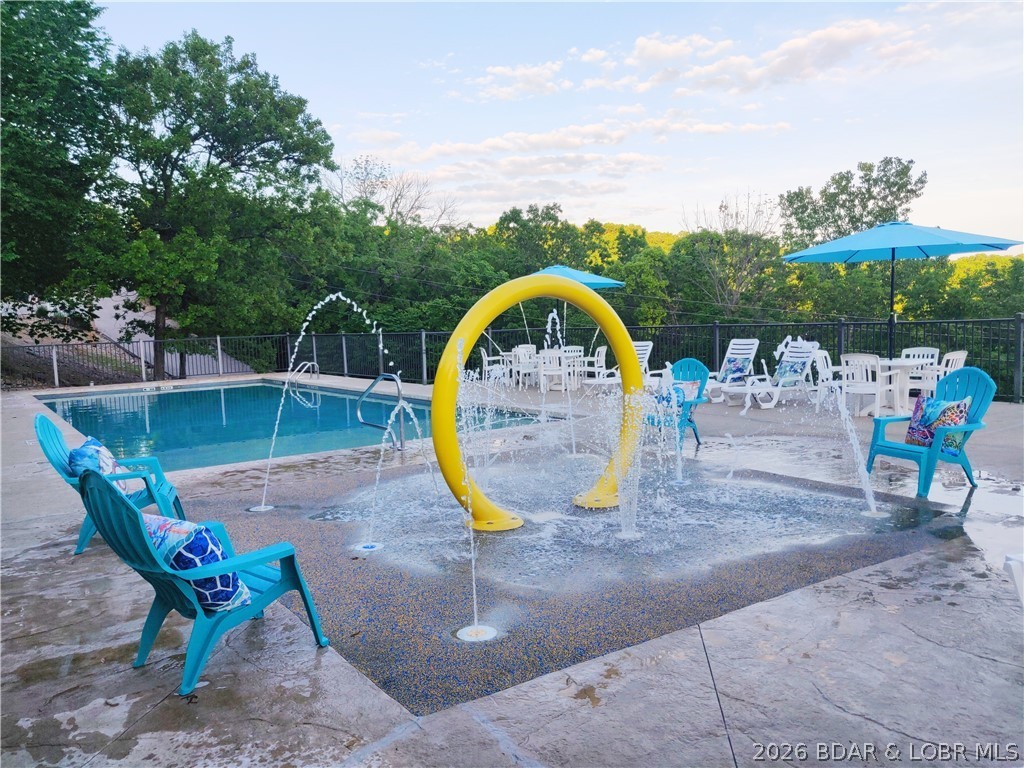 1082 Rachel Road, Unit 29 Osage Beach, MO 65065 - Photo 28 of 32 Splash pad for the kids
