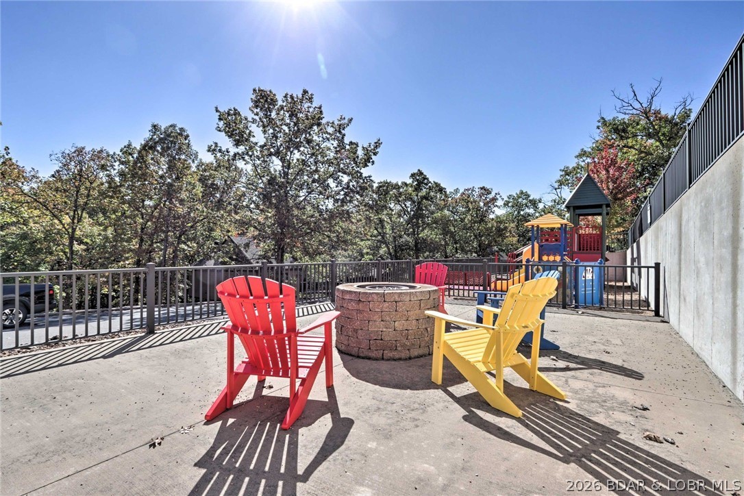1082 Rachel Road, Unit 29 Osage Beach, MO 65065 - Photo 29 of 32 Community fire pit