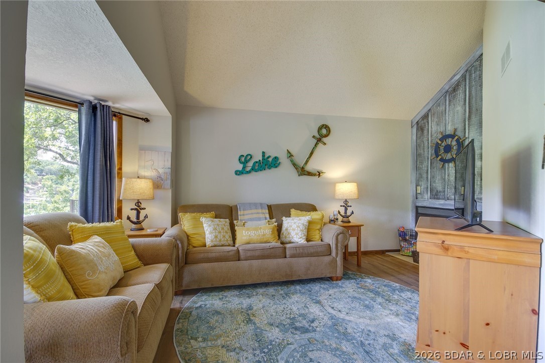 1082 Rachel Road, Unit 29 Osage Beach, MO 65065 - Photo 8 of 32 Family room for relaxing.