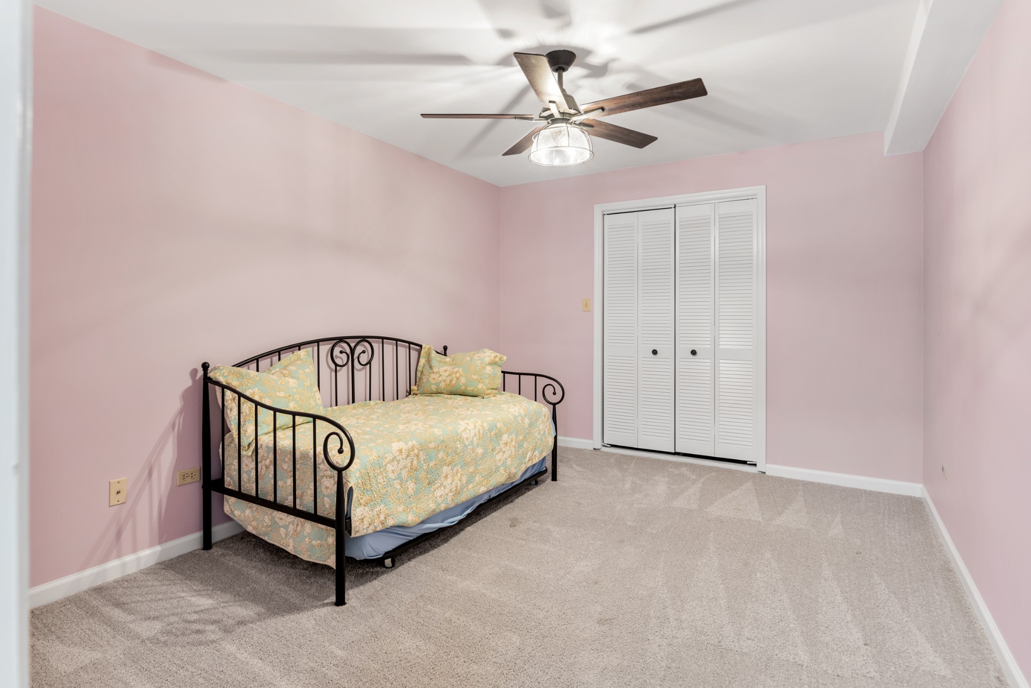 719 Waco Road Lynnville, TN 38472 - Photo 40 of 67 a bedroom with a bed and a chandelier fan