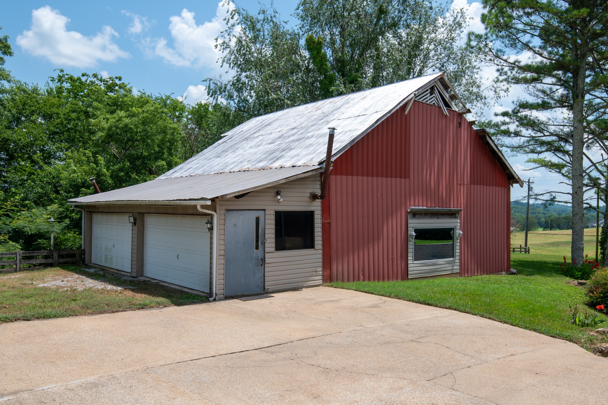 719 Waco Road Lynnville, TN 38472 - Photo 48 of 67 a front view of house with yard and trees all around