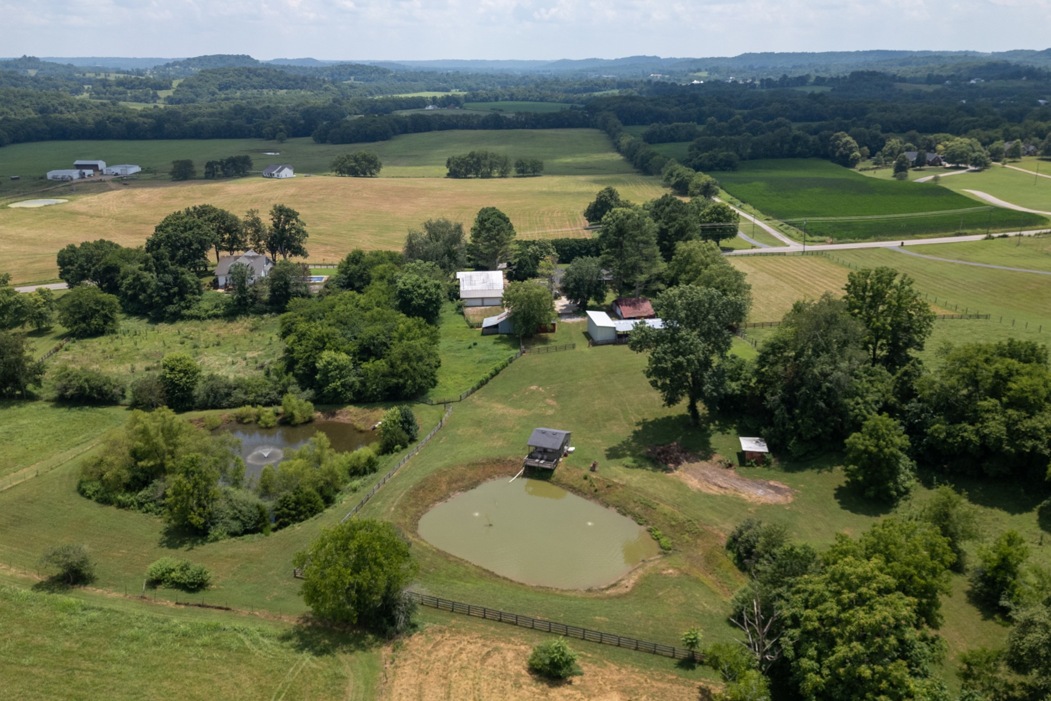 719 Waco Road Lynnville, TN 38472 - Photo 58 of 67 a aerial view of a house with a lake view