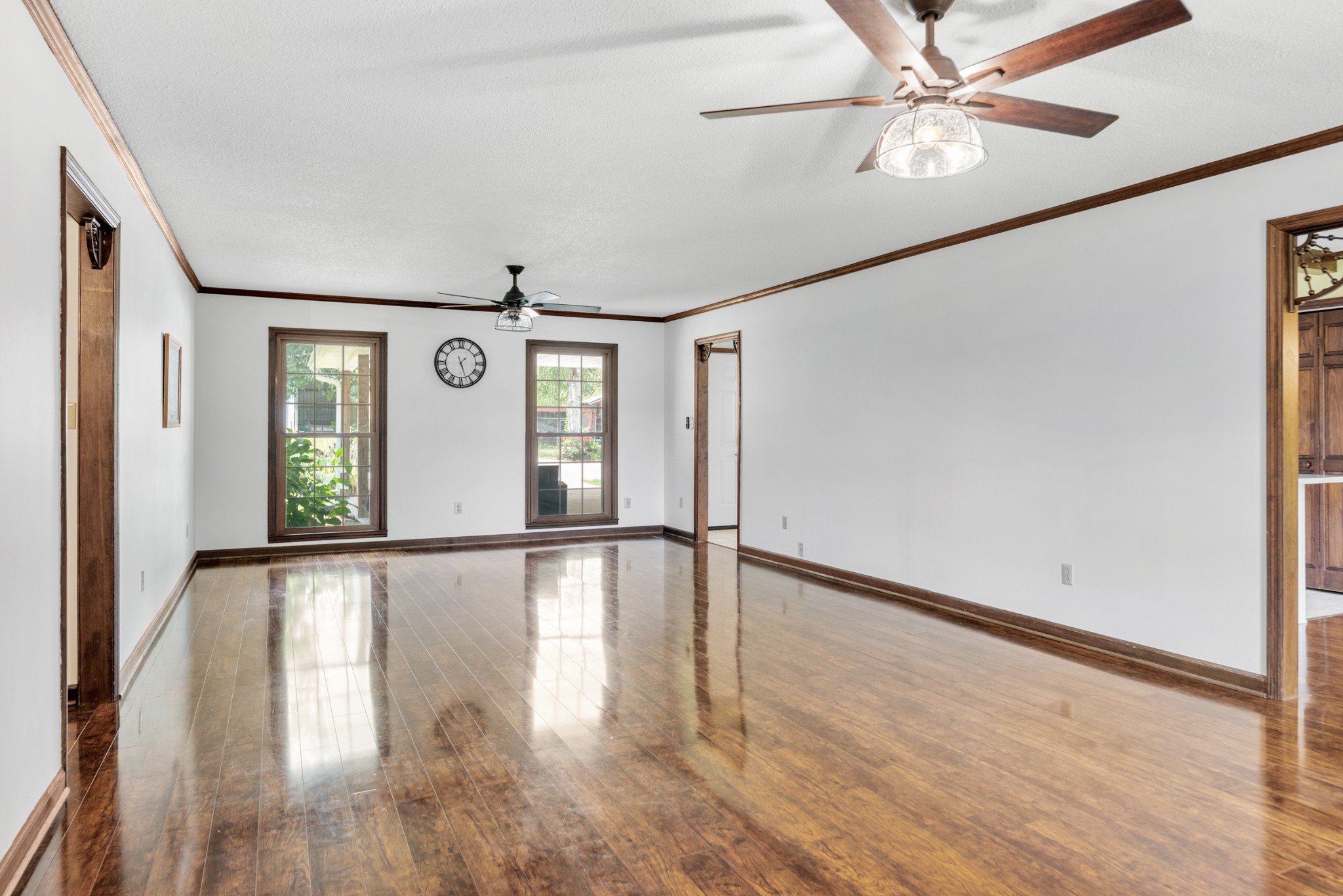 719 Waco Road Lynnville, TN 38472 - Photo 9 of 67 a view of an empty room with window and wooden floor