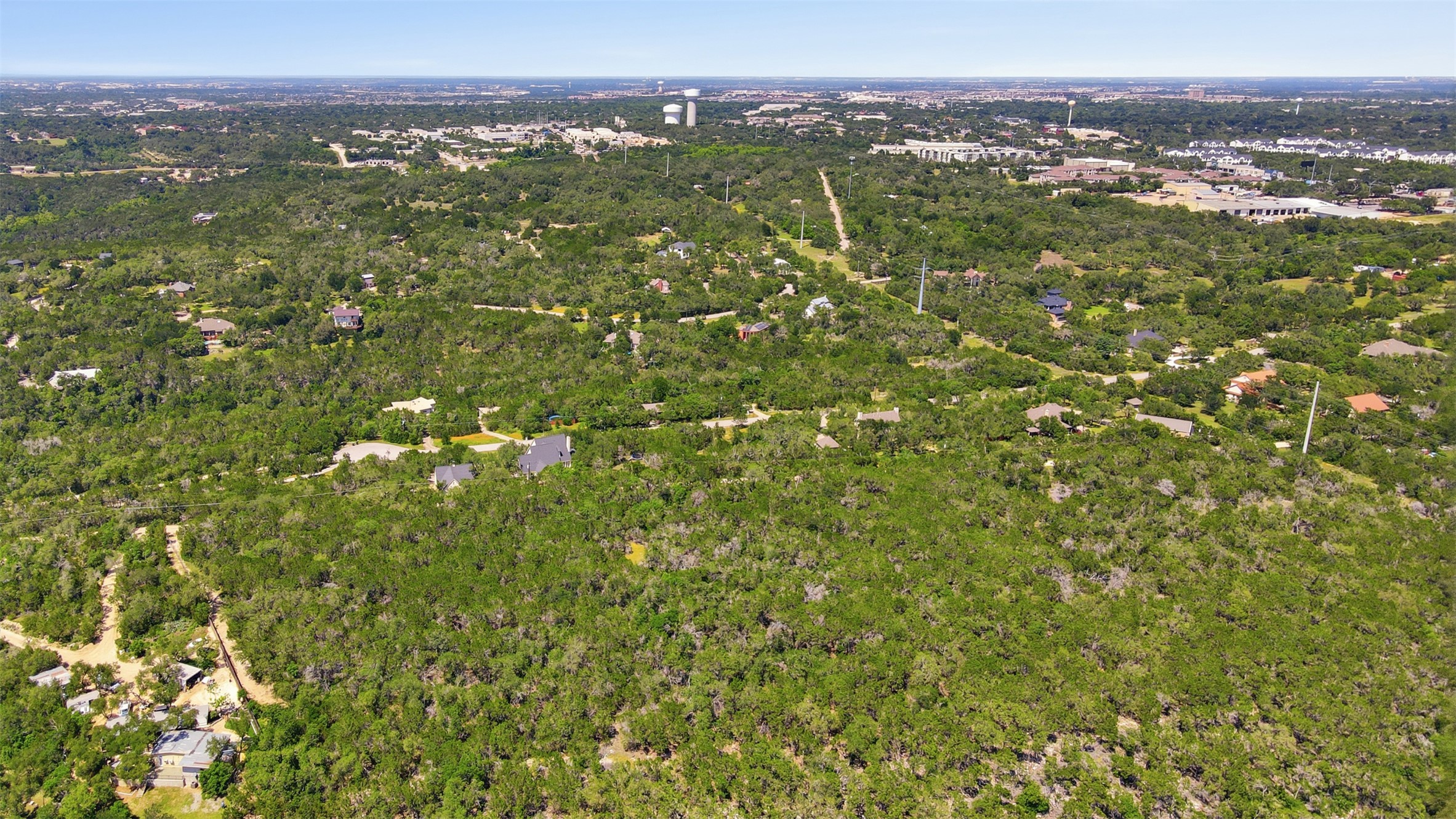0 North Ranch Road 620 Road Austin, TX 78726 - Photo 12 of 20 a view of a city with lush green forest