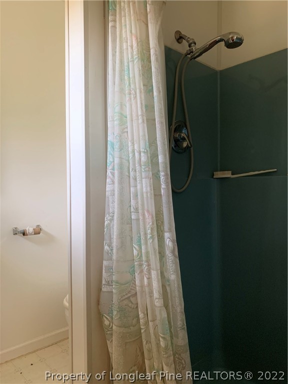 350 Horseshoe Road Aberdeen, NC 28315 - Photo 27 of 47 a bathroom with a shower