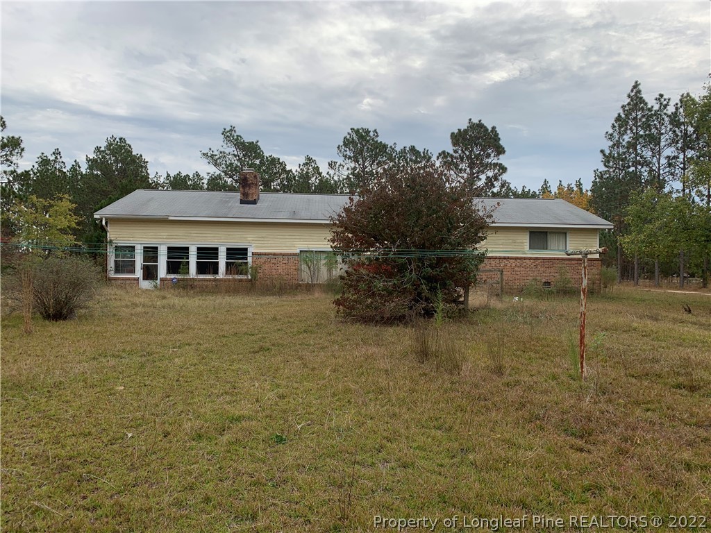 350 Horseshoe Road Aberdeen, NC 28315 - Photo 47 of 47 a front view of a house with a yard