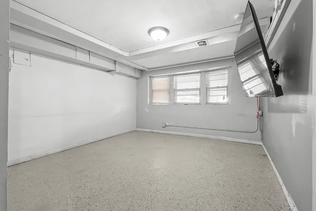 a view of a livingroom with a flat screen tv