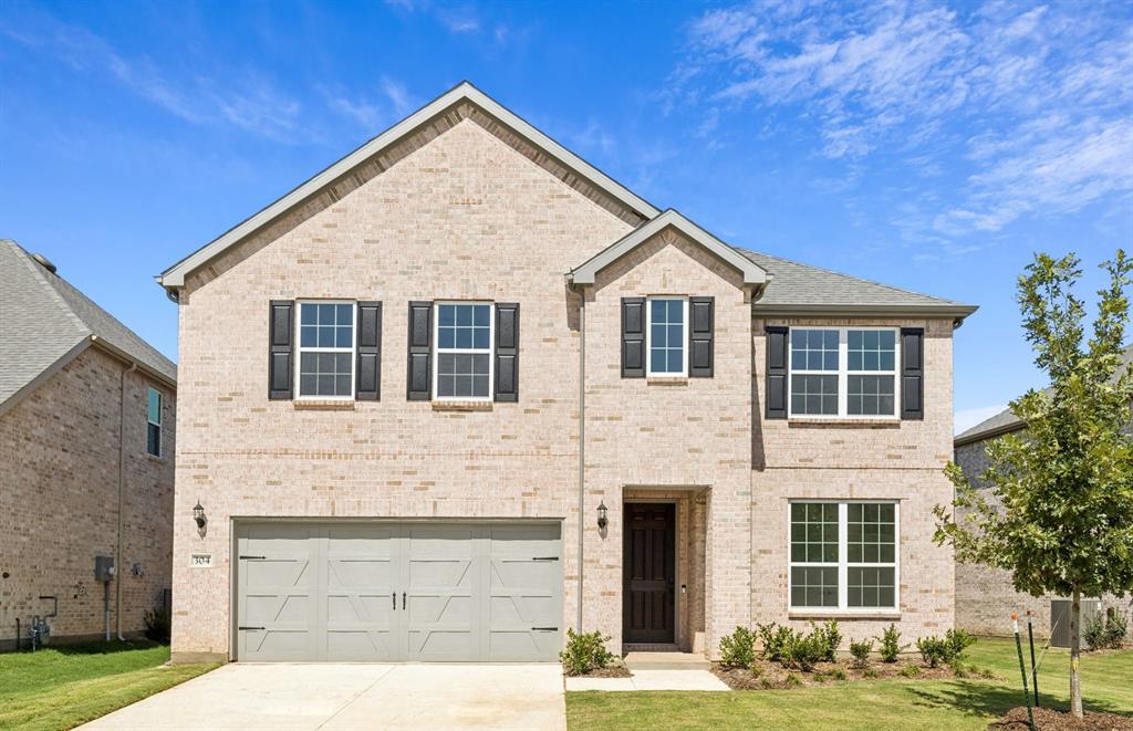 304 Brookhurst Road Little Elm, TX 75068 - Photo 1 of 22 a view of house with yard
