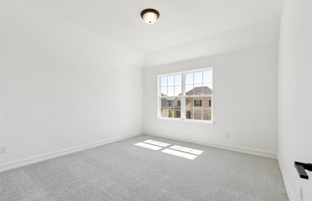 304 Brookhurst Road Little Elm, TX 75068 - Photo 16 of 22 a view of empty room with window