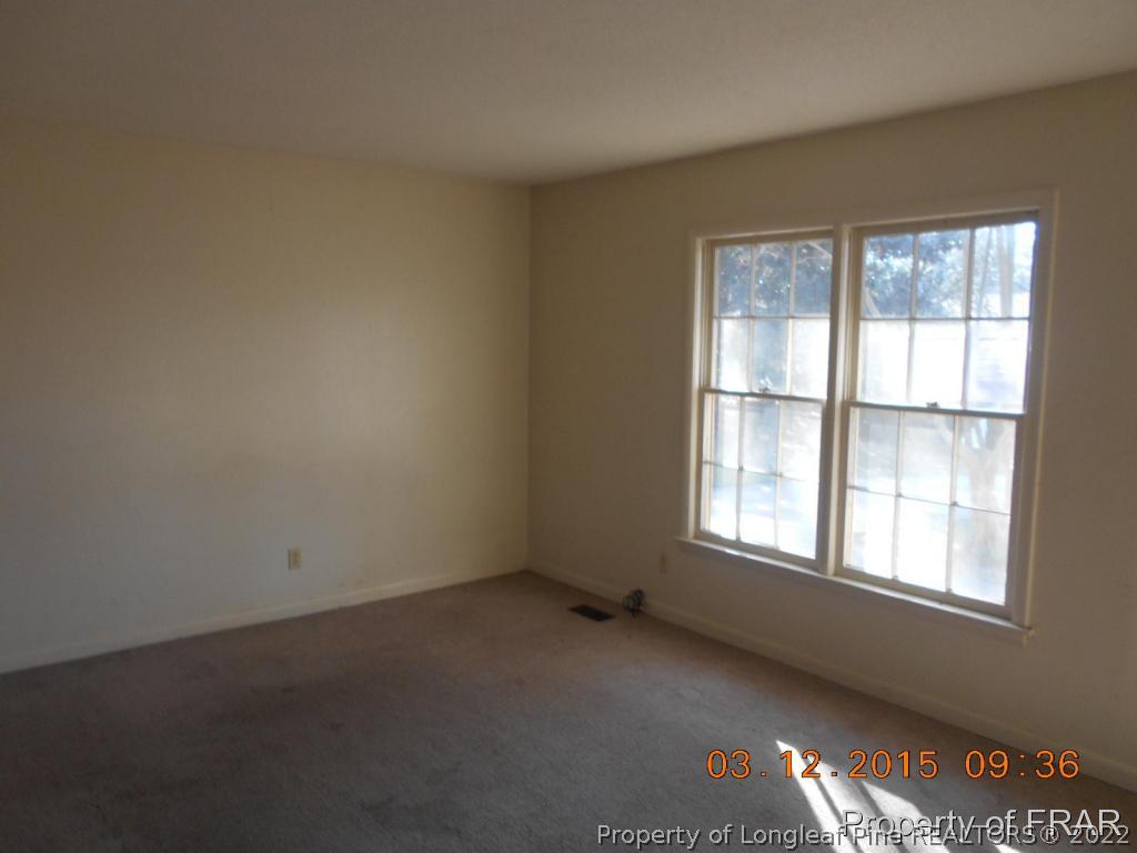 2223 Shaw Rd Extension Fayetteville, NC 28311 - Photo 3 of 10 an empty room with a window