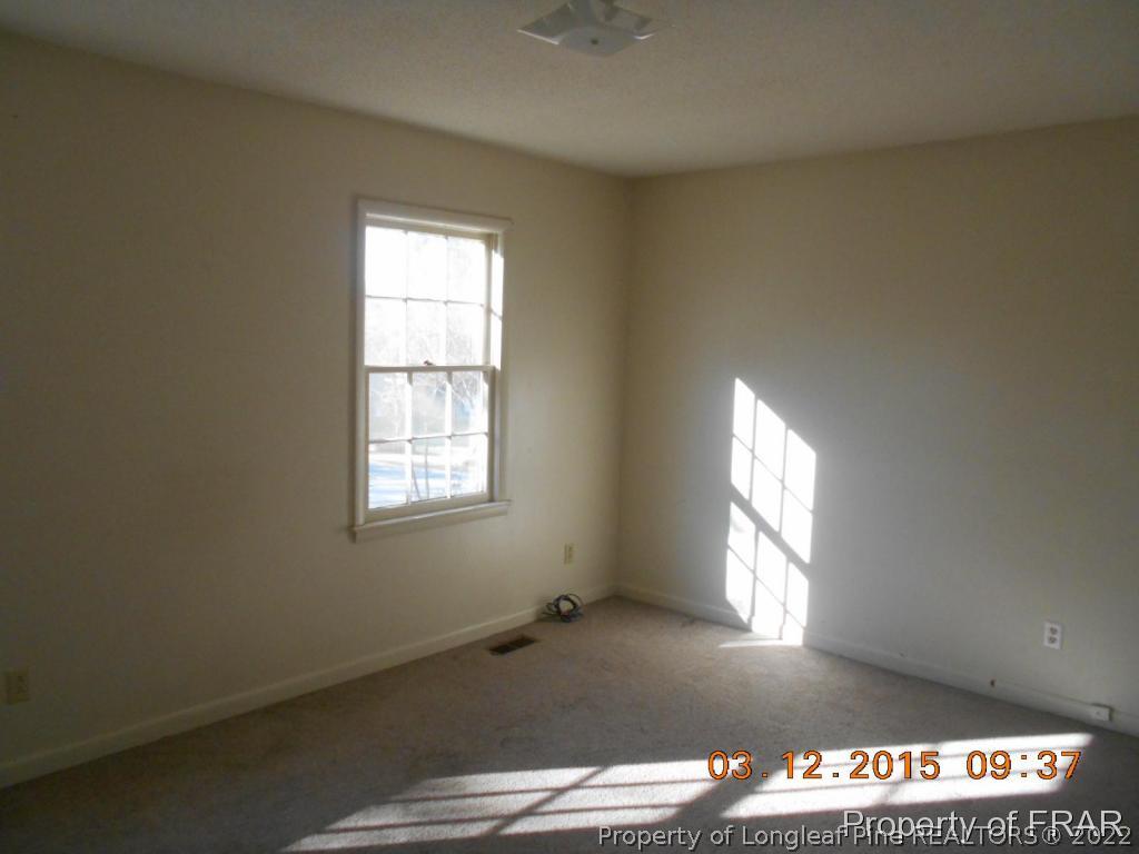 2223 Shaw Rd Extension Fayetteville, NC 28311 - Photo 8 of 10 a view of an empty room with a window